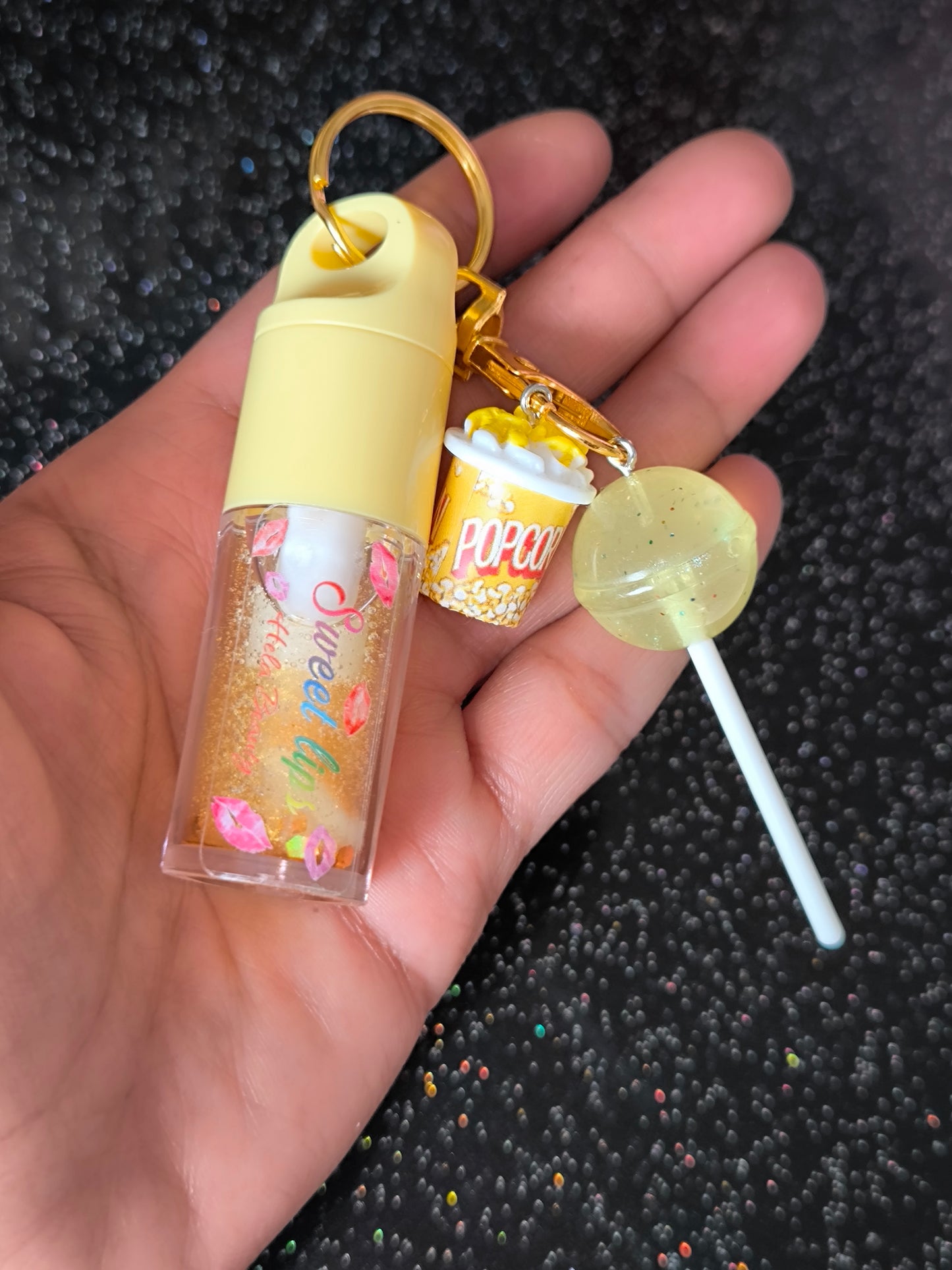 PORTE CLÉ HUILE À LÈVRES SCINTILLANTE GOLD POPCORN