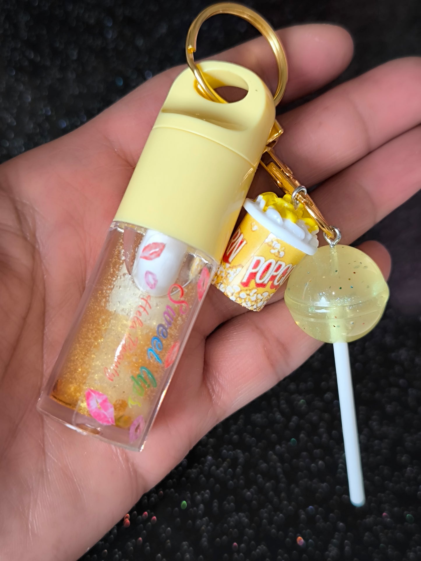 PORTE CLÉ HUILE À LÈVRES SCINTILLANTE GOLD POPCORN