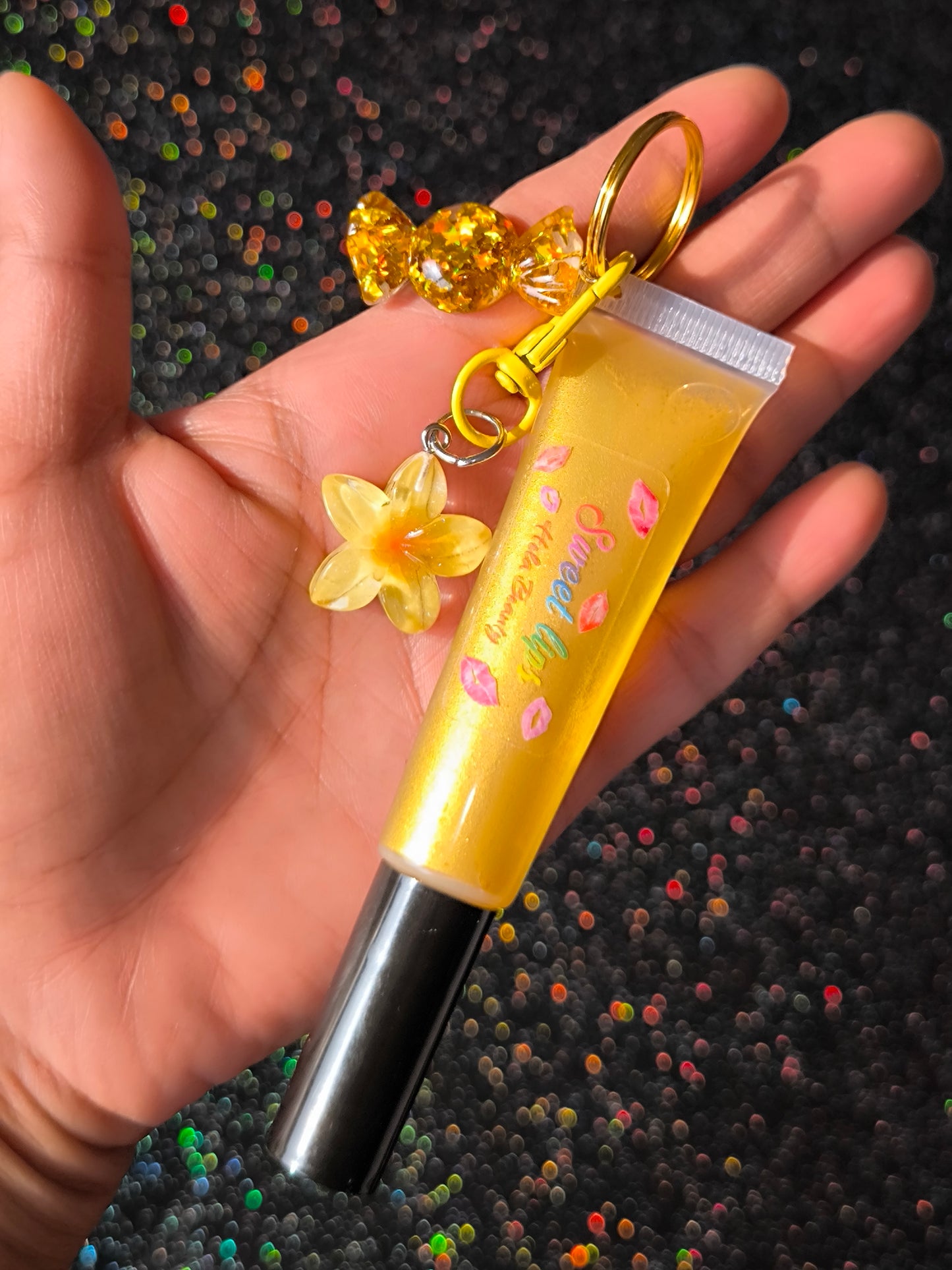 PORTE CLÉ HUILE À LÈVRES SCINTILLANTE GOLD FLOWER 🌼