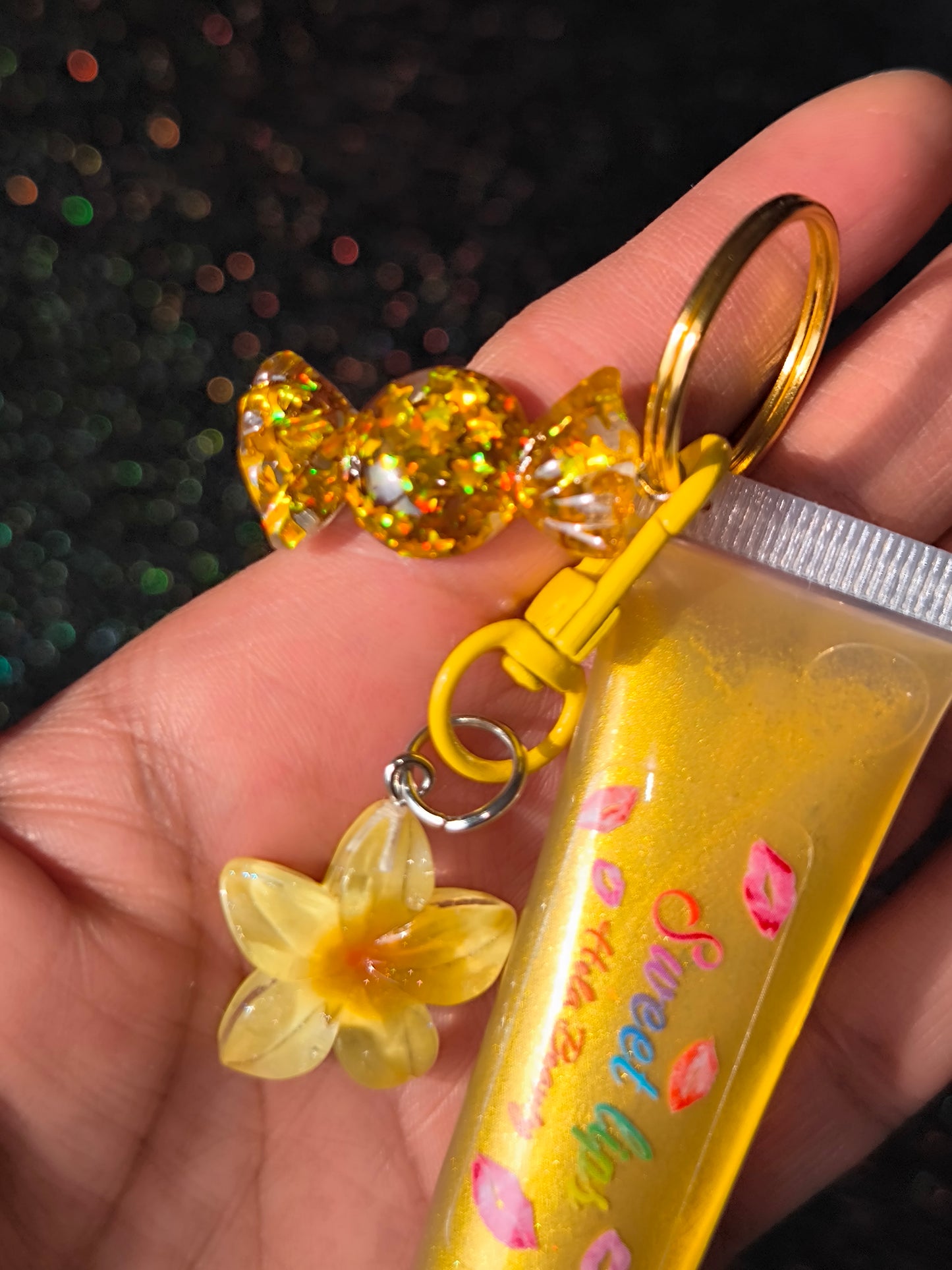 PORTE CLÉ HUILE À LÈVRES SCINTILLANTE GOLD FLOWER 🌼