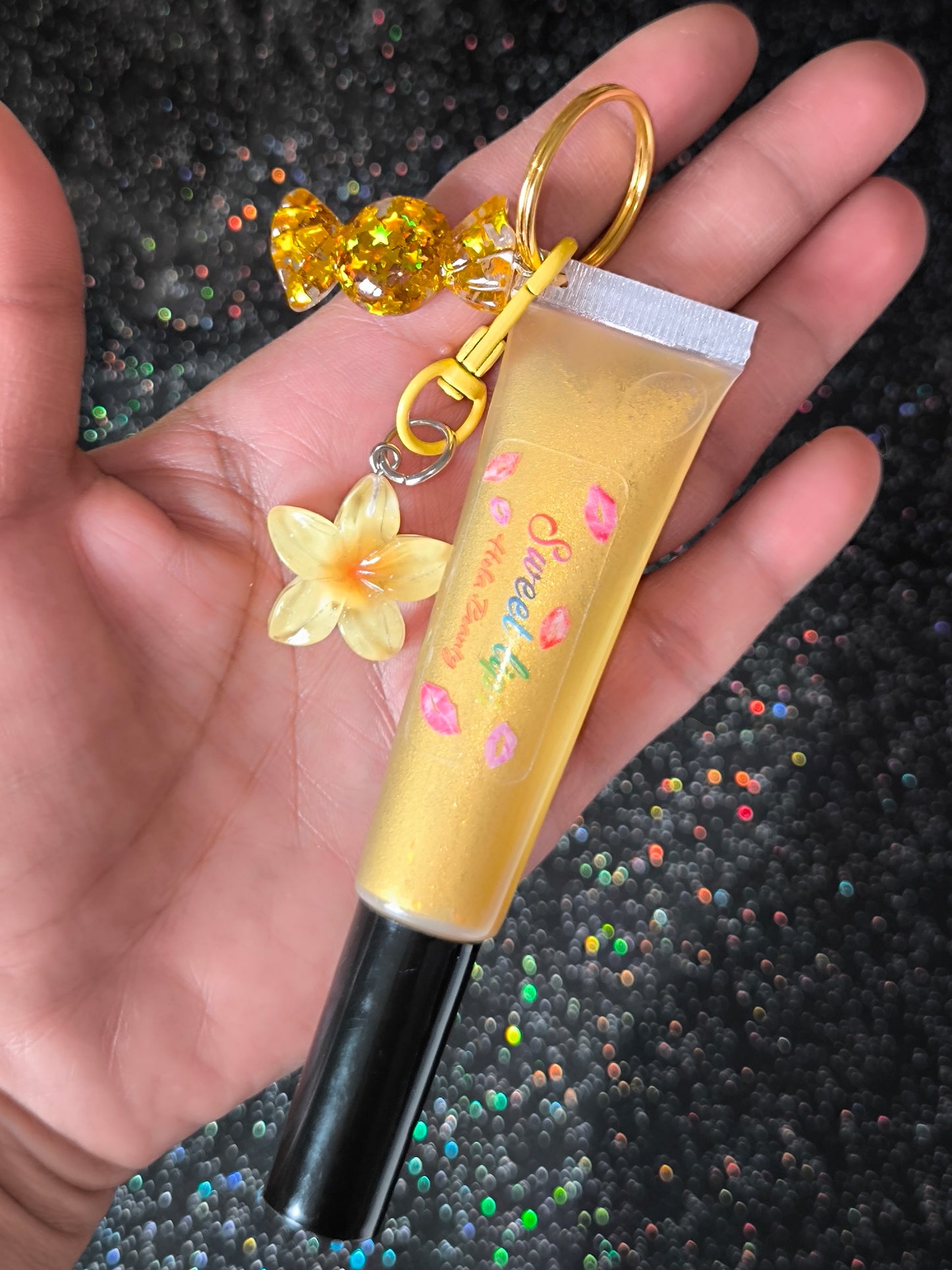 PORTE CLÉ HUILE À LÈVRES SCINTILLANTE GOLD FLOWER 🌼