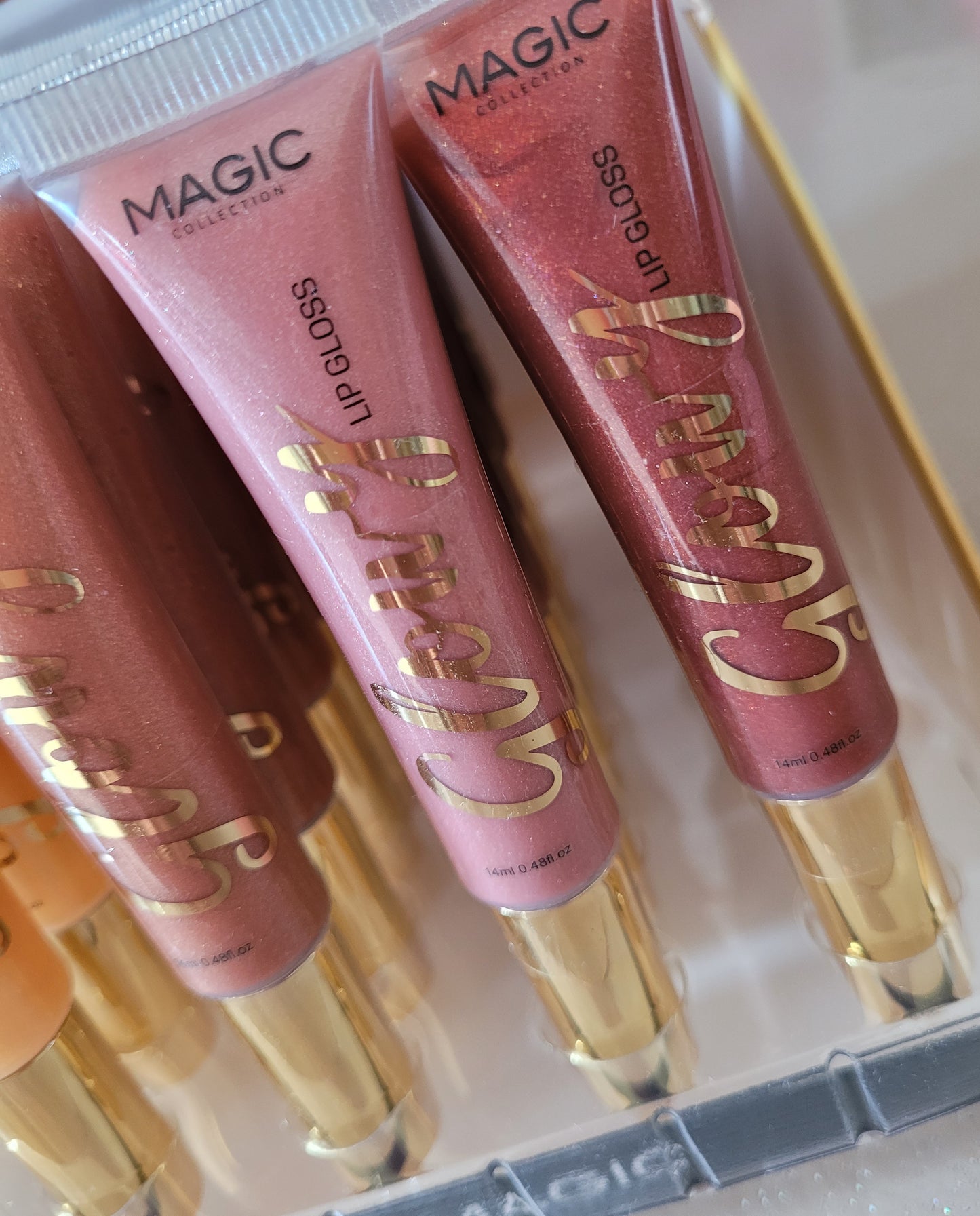 Gloss à lèvres pailleté Glowy Magic